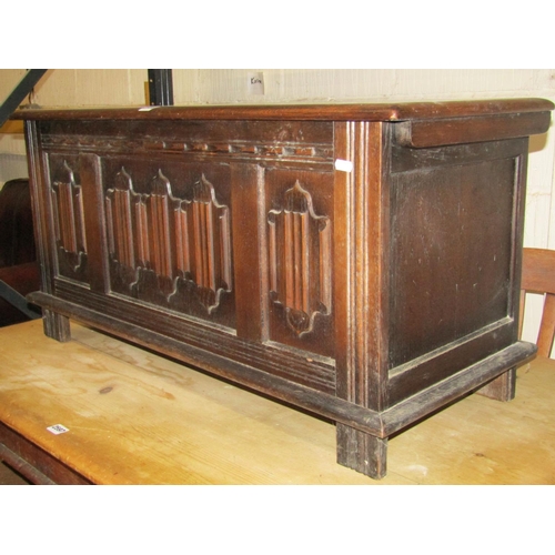 2596 - A small old English oak coffer with linen fold front, 95cm wide