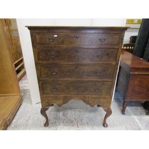 2604 - A Queen Ann style walnut veneered chest on stand with four long graduated drawers, with cabriole sup... 