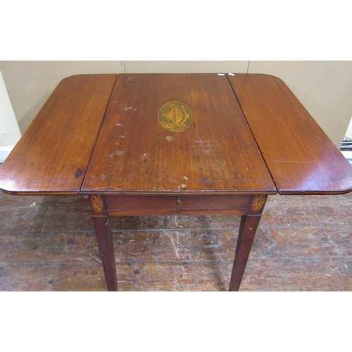 2430 - A Georgian mahogany Pembroke table raised on square tapered legs, the top with inlaid oval panel det... 