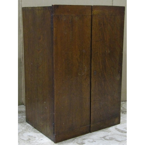 2239 - A reproduction mahogany veneered floorstanding revolving bookcase, 61 cm square x 124 cm high, a rep... 