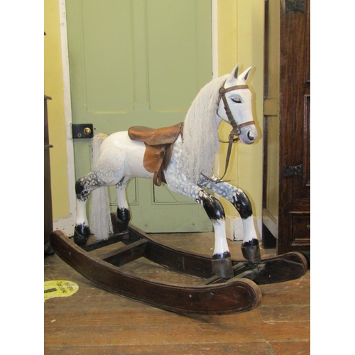 2625 - A vintage dapple grey painted wooden rocking horse raised on a cradle framework 110cm h x 136cm L