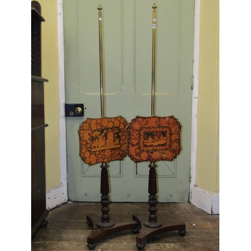 2678 - Pair of Regency rosewood and brass pole/face screen stands with carving detail, with shaped panels o... 