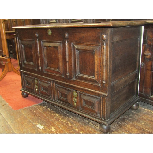 2778 - An 18th century oak mule chest with panel and block moulded detail over two drawers, 122cm wide