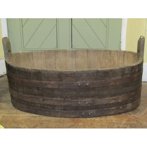 2779 - A coopered oak and steel banded oval tub 94cm x 61cm x 45cm (full height)