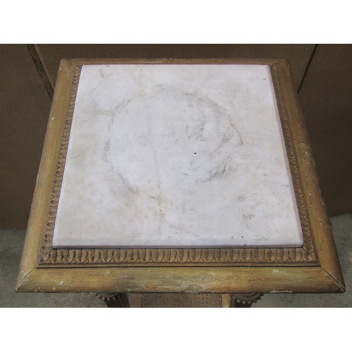 2221a - A gilt wood plant stand with inset marble top and carved classical detail 33cm x 111cm h