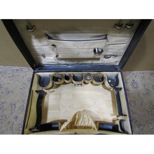 2316 - A Goldsmiths and Silversmiths Ltd leather vanity case with silk lined interior, (lacks fittings) tog... 