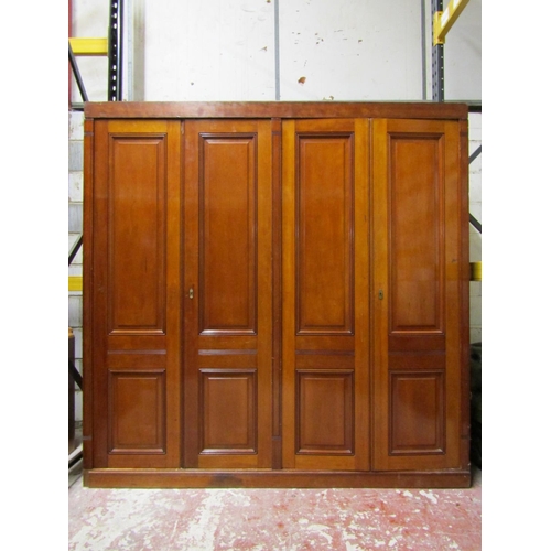 2627 - Antique fruitwood wardrobe enclosed by four fielded paneled doors (will flat-pack for ease of remova... 