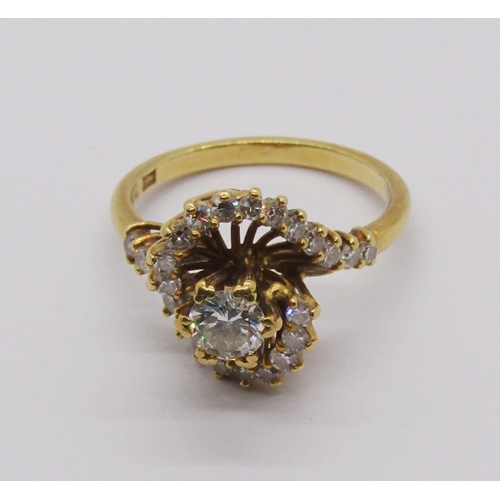 1322 - Impressive vintage diamond cluster ring of stylised crossover design, centre stone 0.50cts approx, s... 