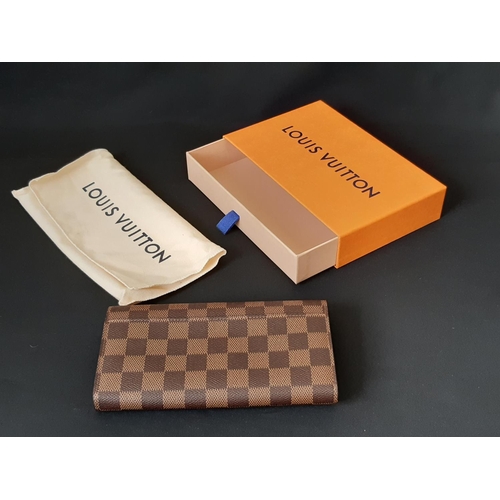 1627 - 'Sarah' wallet by Louis Vuitton (current style) in Damier Ebene canvas with pink leather lining, two... 