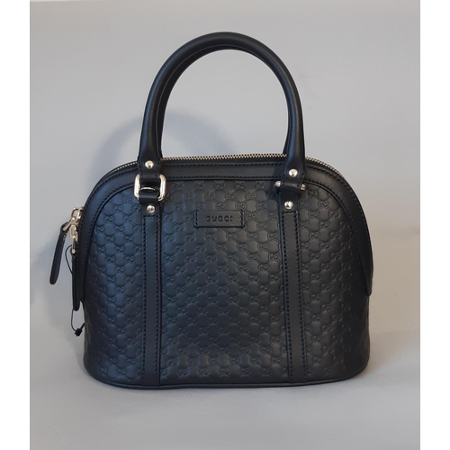 1628 - Gucci ladies handbag in black leather 'Microguccissima Mini Dome' unused, with dual handles, zip clo... 