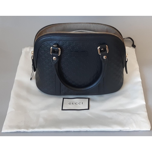 1628 - Gucci ladies handbag in black leather 'Microguccissima Mini Dome' unused, with dual handles, zip clo... 