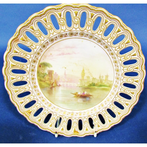 1071 - A Copeland plate with landscape panel showing a view of Florence set within a pierced and gilded bor... 