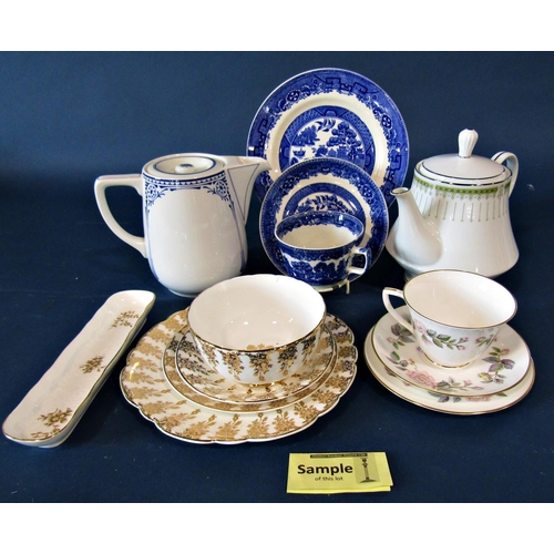 1097 - A collection of Willow pattern blue and white tea wares, a Luberne white and gilt collection of tea ... 