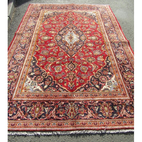 2523 - A Central Persian Kashan Carpet with book cover design in red, blue and natural wool tones with yell... 