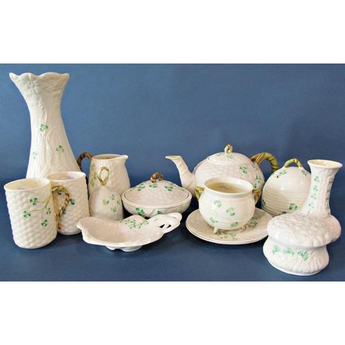 1012 - A collection of 20th century Belleek porcelain of varying dates, principally with shamrock detail co... 