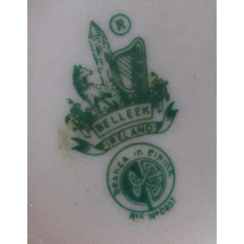 1012 - A collection of 20th century Belleek porcelain of varying dates, principally with shamrock detail co... 