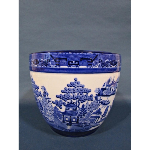 1045 - A Mintons blue and white transfer printed jardinière with Willow pattern panels within a repeating b... 