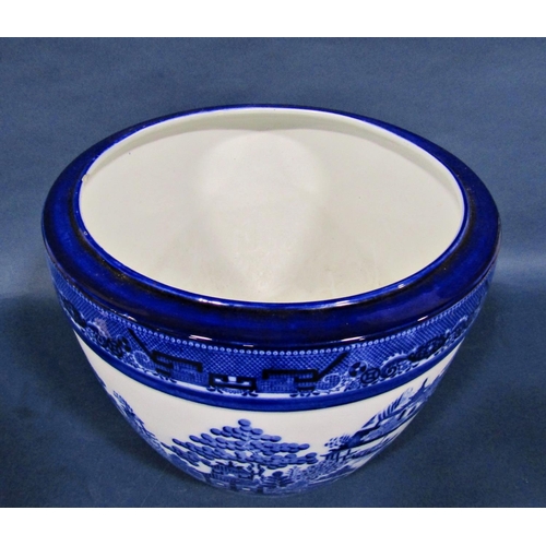 1045 - A Mintons blue and white transfer printed jardinière with Willow pattern panels within a repeating b... 