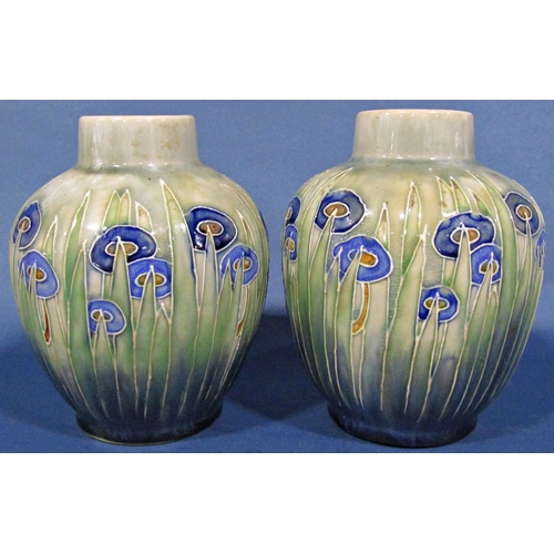 1049 - A pair of Doulton oviform vases with drawn necks and abstract floral detail