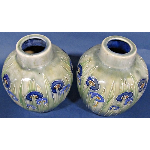 1049 - A pair of Doulton oviform vases with drawn necks and abstract floral detail