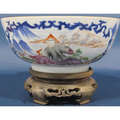 1061 - Late 18th/early 19th century porcelain bowl showing two family groups in a landscape within repeatin... 