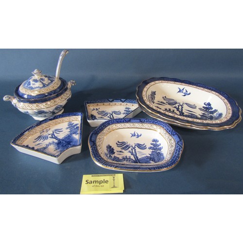 1002 - Booths Real Old Willow pattern seven piece hors d'oeuvres set with timber frame and further matching... 