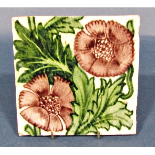 1072 - A William De Morgan Merton abbey tile with floral detail, 16.5cm square approx