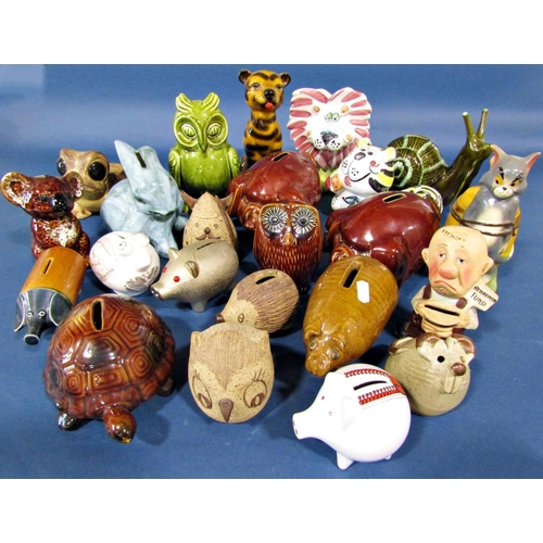 1100 - A collection of whimsical animals some in the form of moneyboxes to include pigs, cats, snails, etc