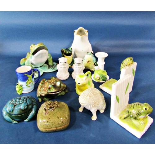 1123 - A collection of whimsical frogs presented as bookends, tankards, money boxes, etc, together with a s... 