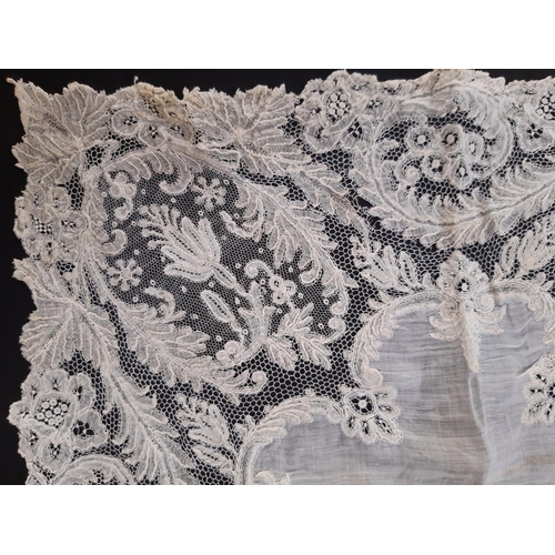 1606 - A collection of handkerchiefs including 6 late 19th/ early 20th century elaborate lace examples, som... 