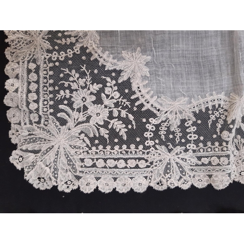 1606 - A collection of handkerchiefs including 6 late 19th/ early 20th century elaborate lace examples, som... 