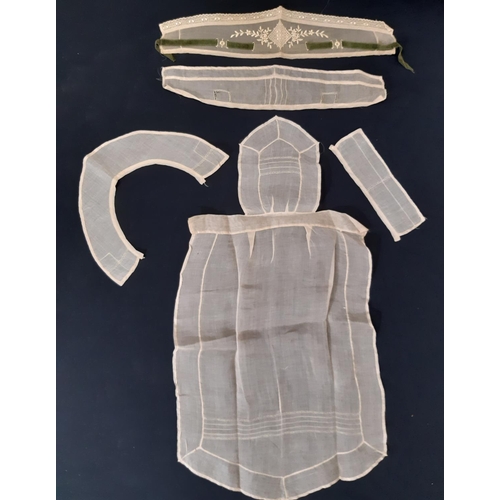 1613 - Circa 1920's household textiles comprising 3 maid's aprons,  an apron in beige starched organza with... 