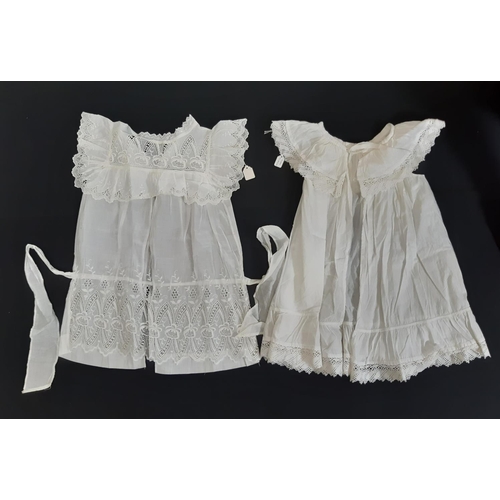 1605 - Eight late 19th/ early 20th century good quality baby gowns, with various designs of lacework, brode... 