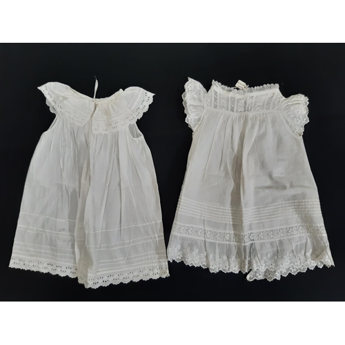 1605 - Eight late 19th/ early 20th century good quality baby gowns, with various designs of lacework, brode... 