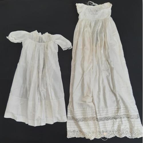 1605 - Eight late 19th/ early 20th century good quality baby gowns, with various designs of lacework, brode... 