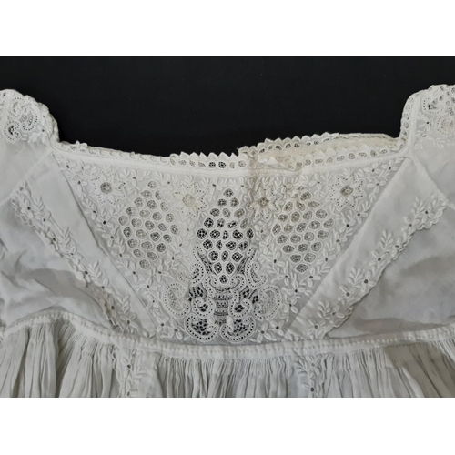 1603 - Eight late 19th/ early 20th century good quality baby gowns, mostly hand stitched, with various desi... 