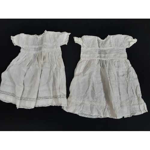 1603 - Eight late 19th/ early 20th century good quality baby gowns, mostly hand stitched, with various desi... 