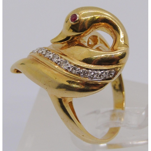 1385 - 14ct novelty swan ring set with diamonds and a ruby, shell stamp to outer shank, size K/L, 7.1g