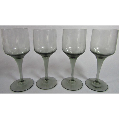 1147 - A collection of Orrefors Rhapsody Smoky grey wine glasses, eleven small wines, 17cm tall, five clare... 