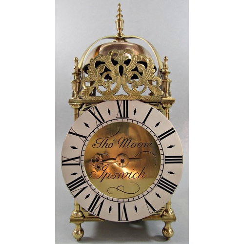 1504 - A 19th century brass lantern clock in the 17th century manner, with later oak bracket, the dial engr... 