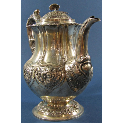 1211 - A Georgian silver teapot with floral engraved decoration, London 1825, maker Joseph Angell I, 27cm h... 