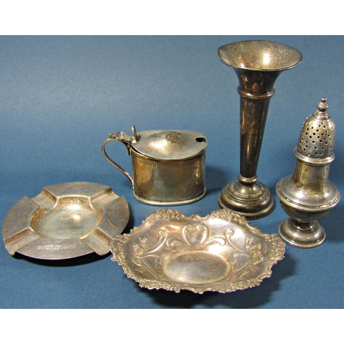 1228 - An assortment of english hallmarked silver to include a pepper pot, ashtray, sherry ladle, assorted ... 