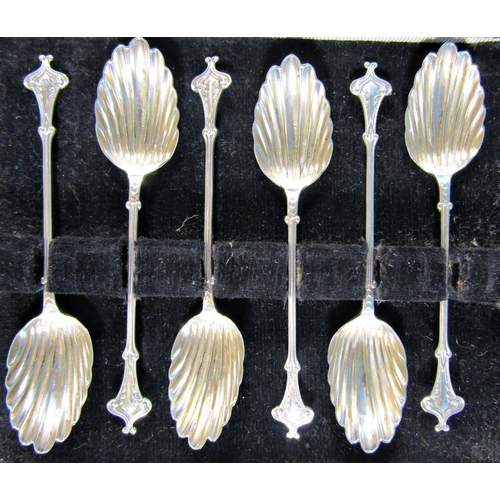 1230 - a cased set of six Georgian teaspoons, a cased set of six silver teaspoons with shell bowls, Birming... 