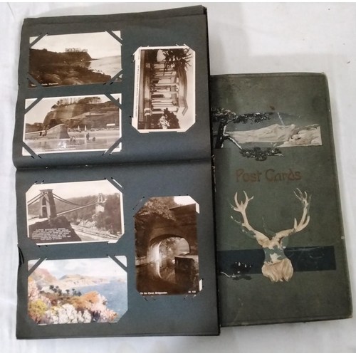 214 - A collection of five albums containing a large quantity of British topographical postcards (1)