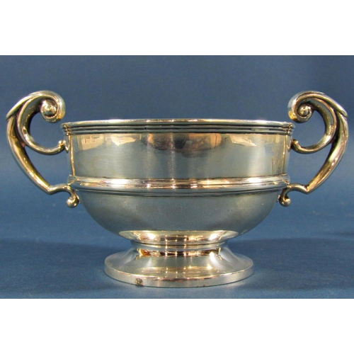 1264 - A silver late Victorian double handled trophy with scrolled handles, Birmingham 1898, maker J W and ... 