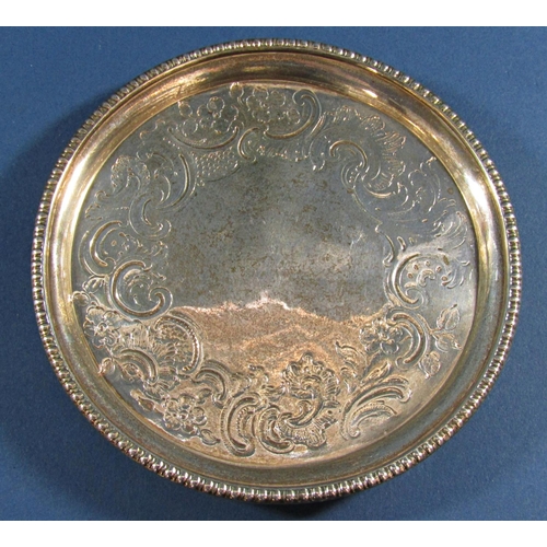 1266 - A Georgian silver card tray with scrolled decoration, Sheffield 1813, maker mark rubbed, 14 cm diame... 