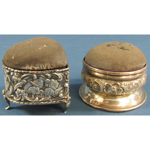 1269A - A mixed selection of small silver items including two pin cushions, two small hand mirrors and silve... 