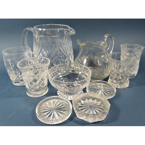 1131 - A quantity of mixed cut glass, including a water jug, various styles of glasses, tealight holders, c... 