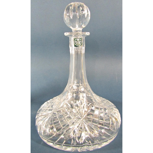 1151 - A Thomas Webb crystal ship’s decanter, a hobnail cut decanter, two further decanters, and a water ju... 