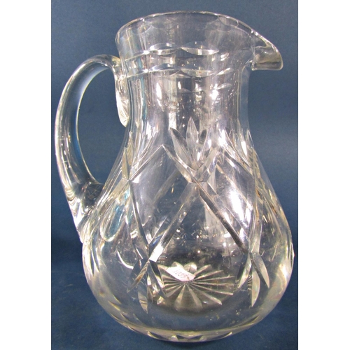 1151 - A Thomas Webb crystal ship’s decanter, a hobnail cut decanter, two further decanters, and a water ju... 